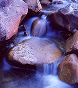 Small blue waterfall.