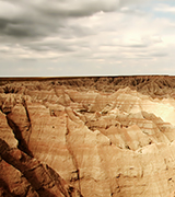 Dakota badlands under a cloudy sky