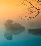 Misty river at dawn.