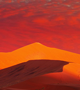 Namib desert dunes at sunset.